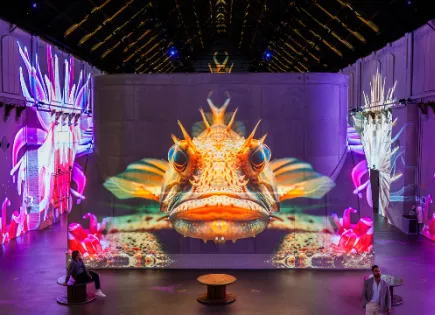 Big yellow fish projected in pink purple space