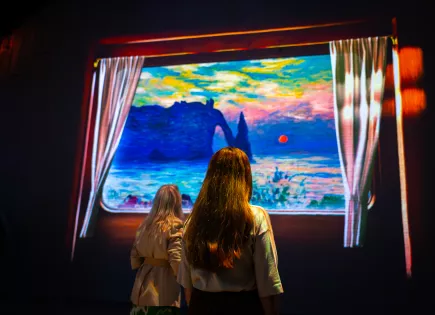 Big yellow fish projected in pink purple space