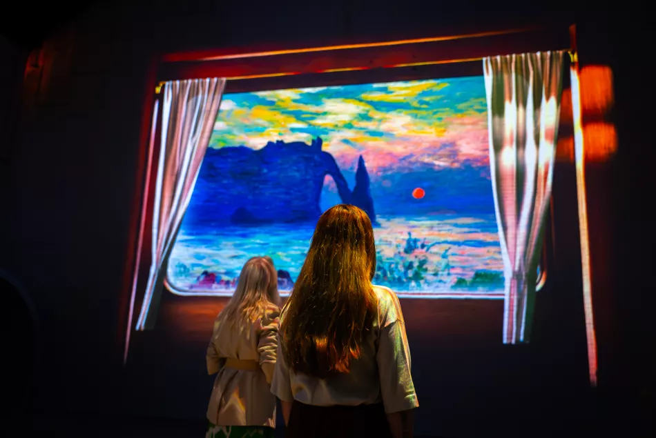 landscape painting Etretat Monet two women admiring 